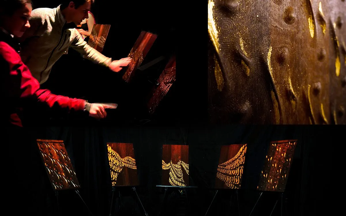 Hands playing the Lagu Hantu sound installation